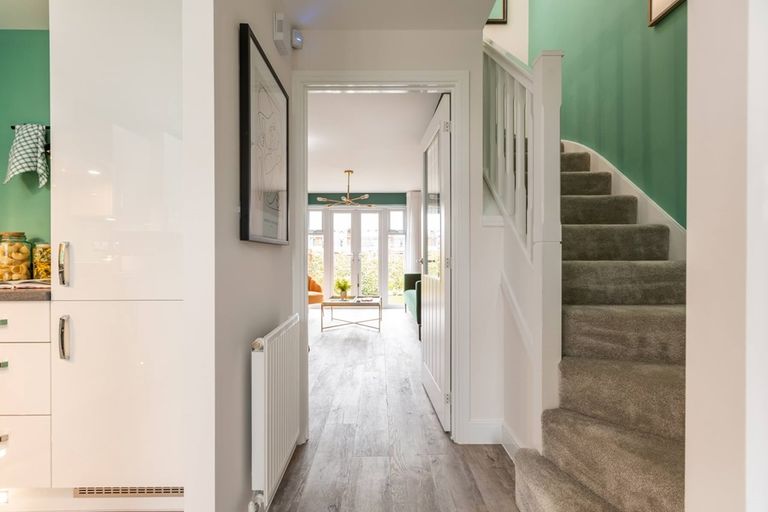 Property 3 of 8. The Canford Has A Bright Hallway With A Convenient Downstairs Toilet