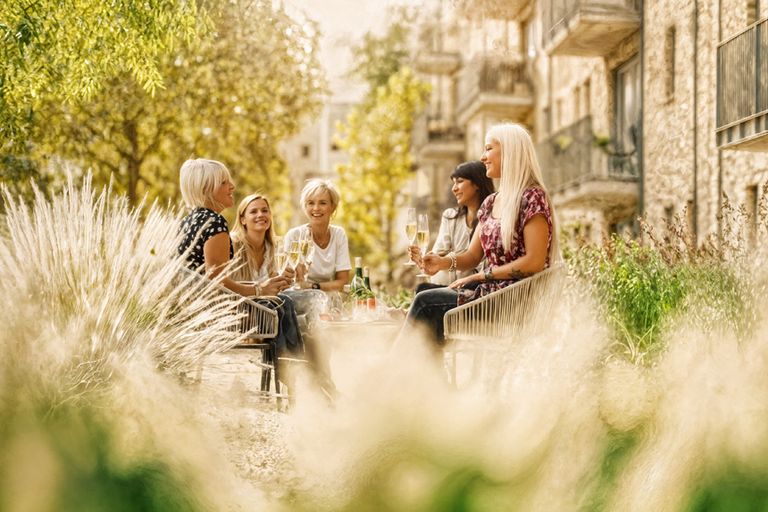 Property 2 of 7. Courtyard Ladies Having Drinks 860x573Px