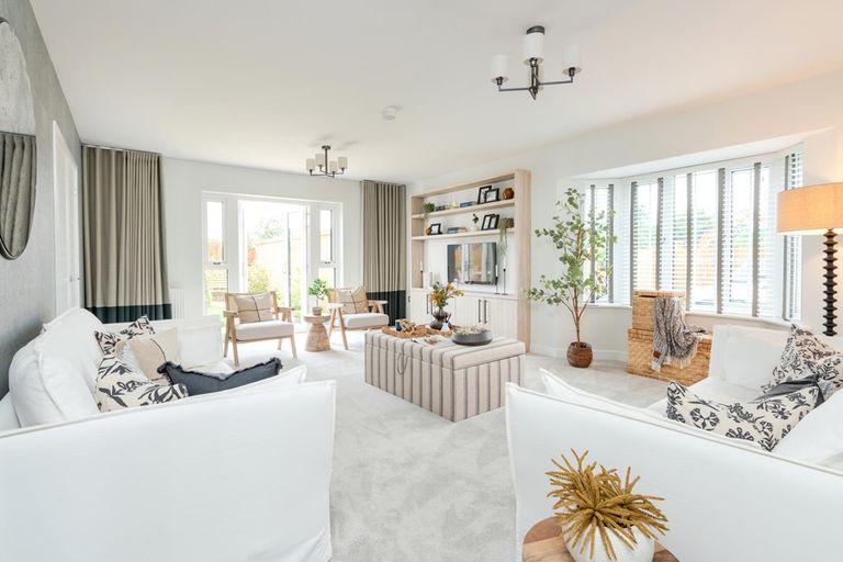 Property 3 of 18. The Spacious Living Room Is Bathed In Natural Light