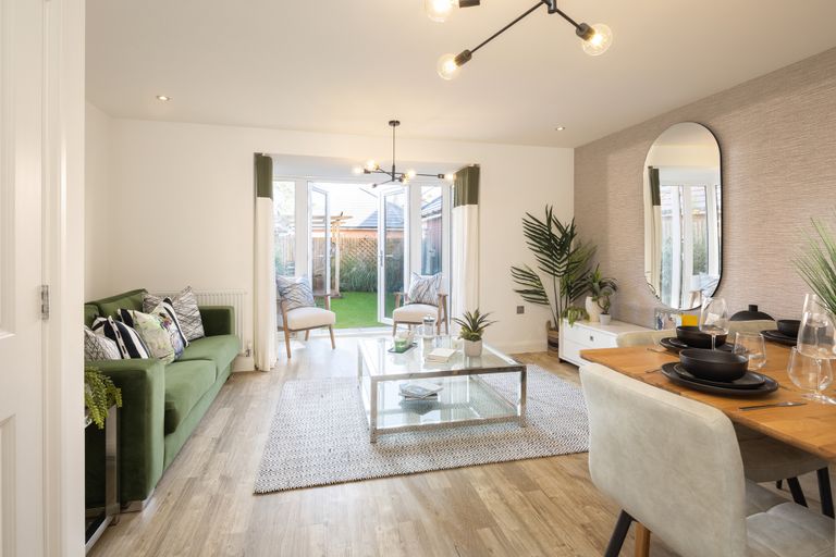 Property 3 of 9. Lounge With French Doors In The Woodcote 4 Bedroom Home