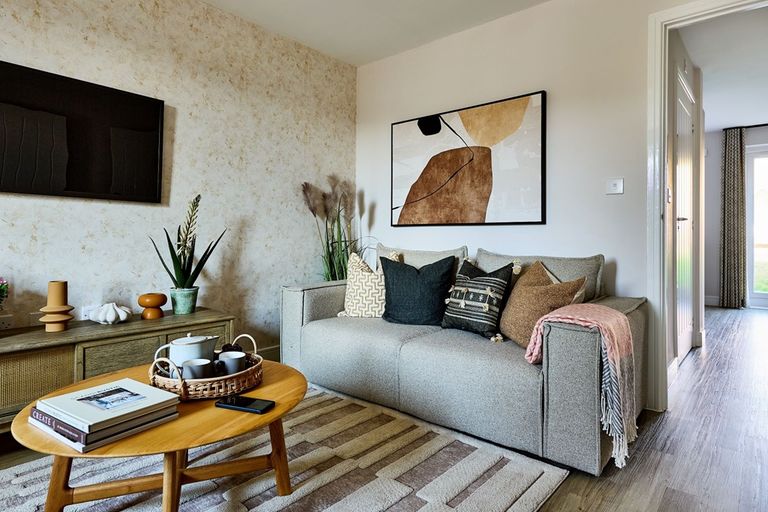 Property 2 of 9. Enjoy Family Time In The Living Room Found At The Front Of The Property