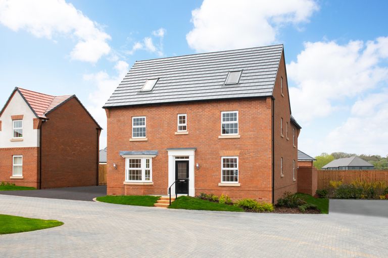 Property 1 of 10. External View Of The Three-Storey, Five Bedroom Moreton Home