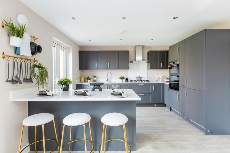 Property 2 of 13. A Modern Kitchen With Breakfast Bar