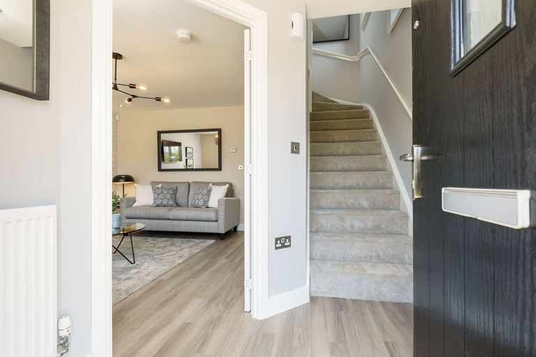 Property 2 of 12. The Entrance Hallway Leads To The Lounge