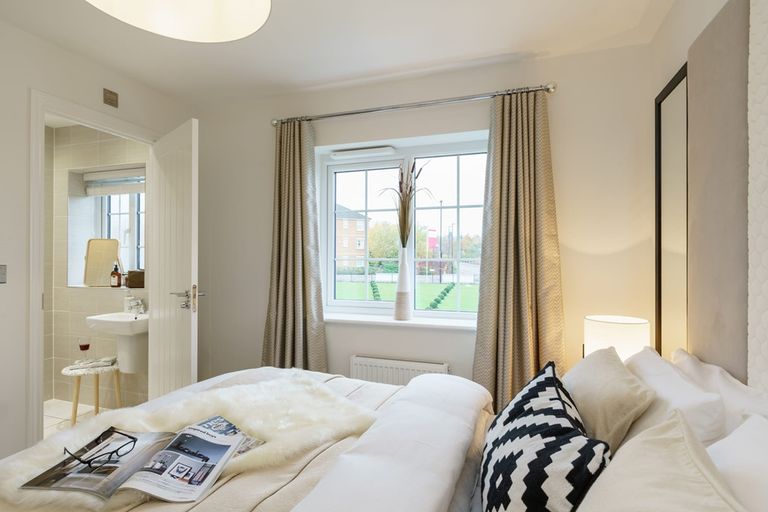 Property 1 of 12. Main Bedroom With Space For A Large Bed And Storage