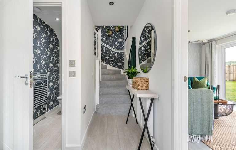 Property 2 of 13. The Boswell Home Has A Bright Welcoming Hallway