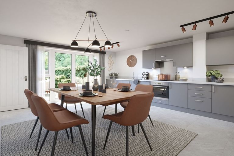 Property 1 of 12. A Modern Kitchen With French Doors Opening To The Rear Garden
