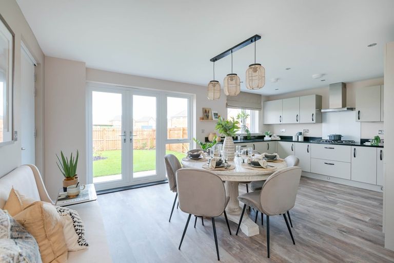 Property 1 of 13. A Modern Kitchen And Dining Area