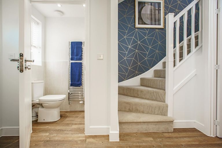 Property 2 of 11. The Canford Has A Bright Hallway With A Convenient Downstairs Toilet