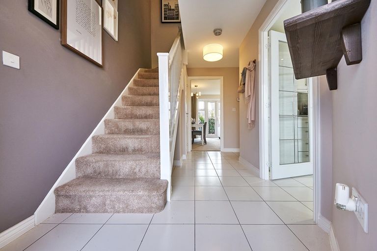 Property 2 of 11. The Benford Has A Spacious Hallway With Under Stair Storage
