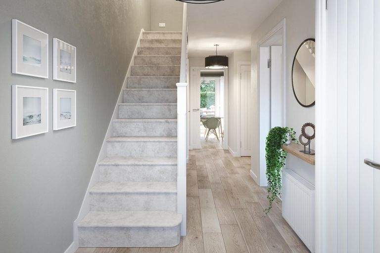 Property 2 of 12. A Welcoming Hallway With Under Stair Storage