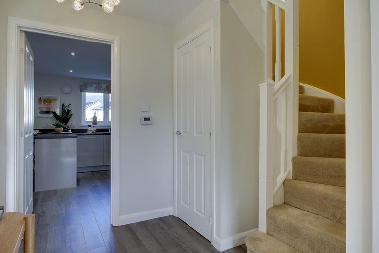 Property 2 of 12. Bright Hallway With Under Stair Storage