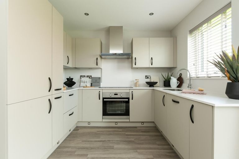 Property 2 of 9. The Modern Kitchen Has Ample Storage And Worktop Space