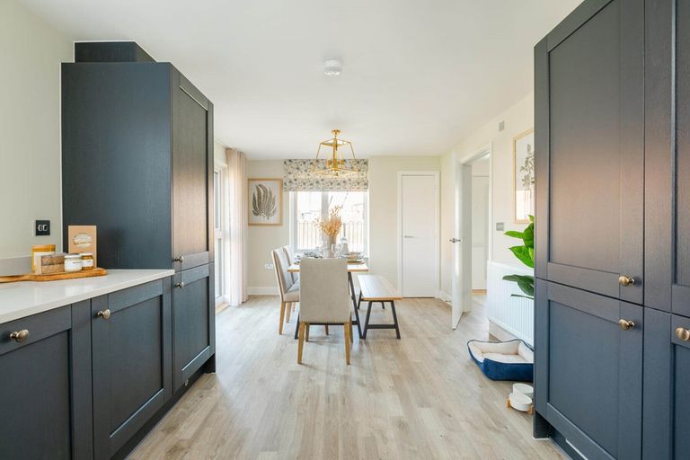 Property 3 of 11. The Dining Area Lead From The Kitchen Through Double Doors To The Garden