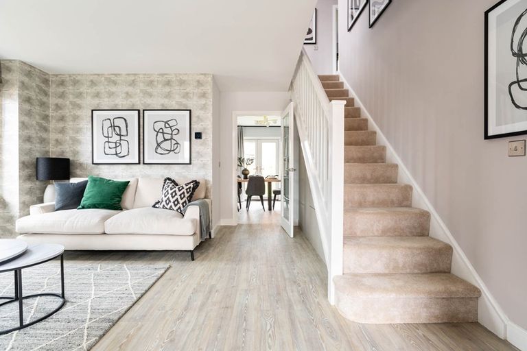 Property 2 of 12. A Welcoming Hallway With Under Stair Storage