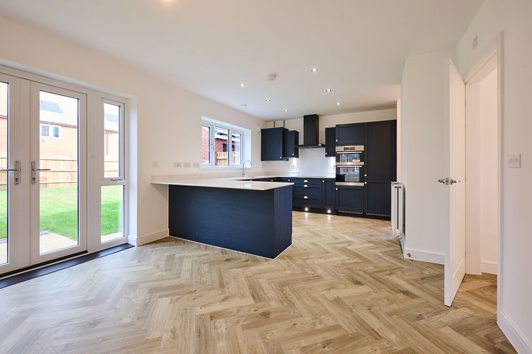 Property 3 of 15. The Stylish Blue Kitchen Is A Great Space For Family And Friends