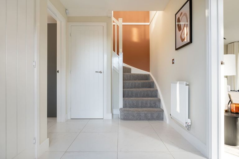 Property 2 of 13. A Light-Filled Hallway Welcomes You Home