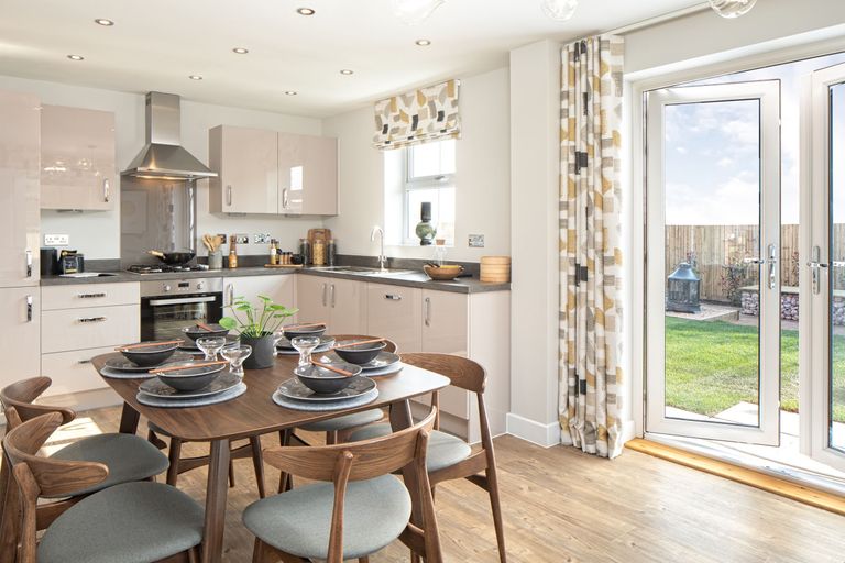 Property 2 of 8. Kitchen/Dining Area And French Doors To Garden Of The Hadley 3 Bedroom Home
