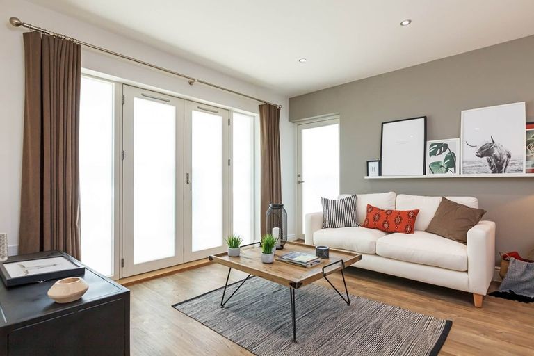 Property 3 of 7. The Living Area Boasts Double Doors Out To The Balcony