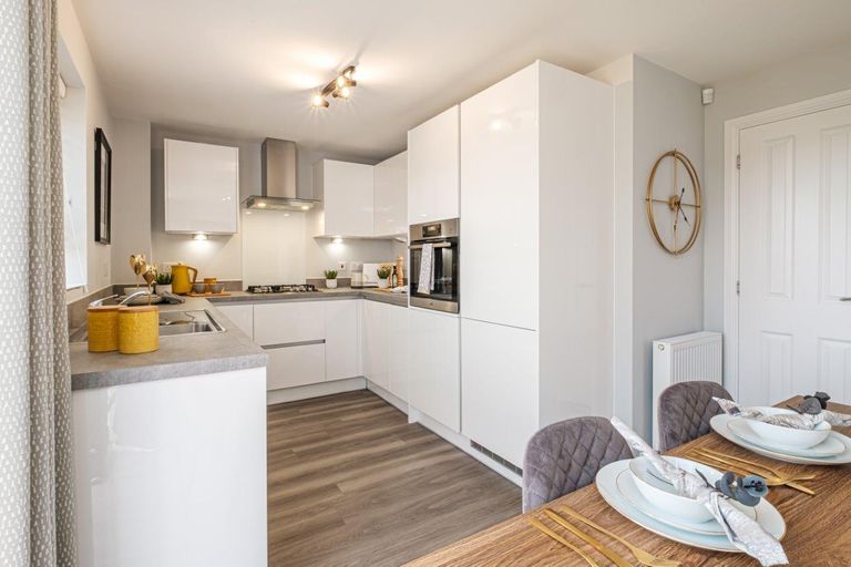 Property 2 of 10. Photo Of A Modern Kitchen With White Shiny Units