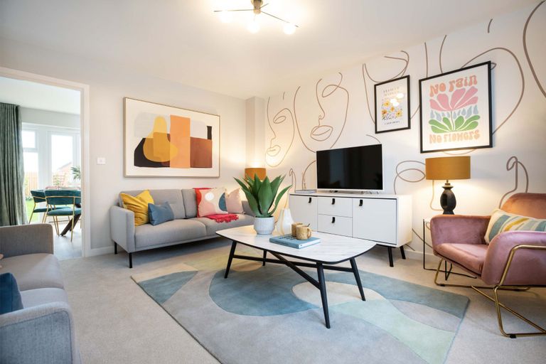 Property 3 of 9. A Modern Living Room With A Grey Sofa And Abstract Art In The Foreground