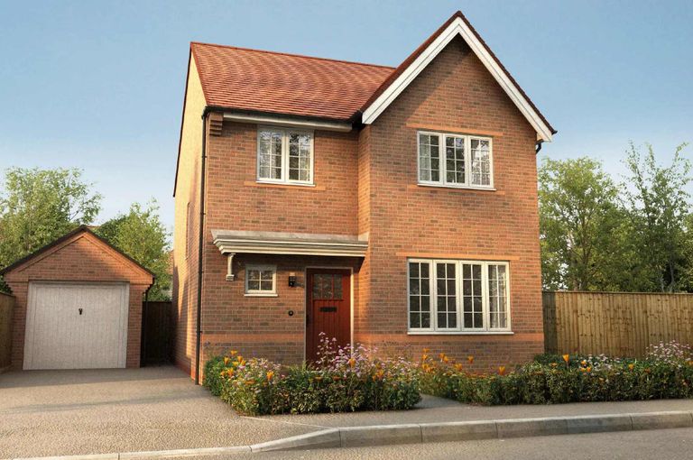 Property 1 of 10. A Two-Story Brick House With A Red Tile Roof, Surrounded By A Garden And A Garage