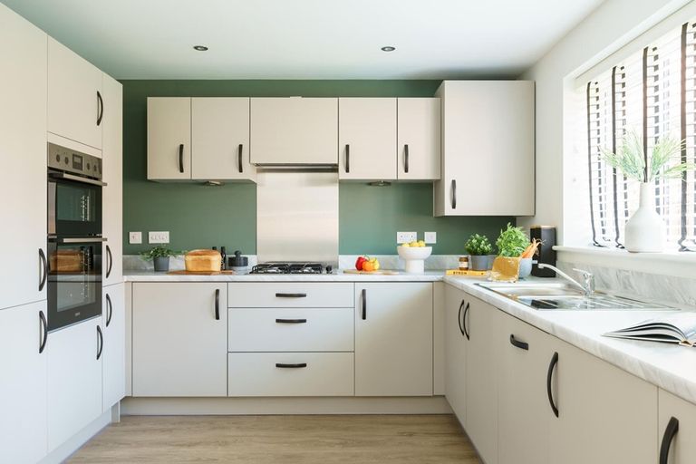Property 3 of 13. The Modern Kitchen Has Ample Storage Cupboards