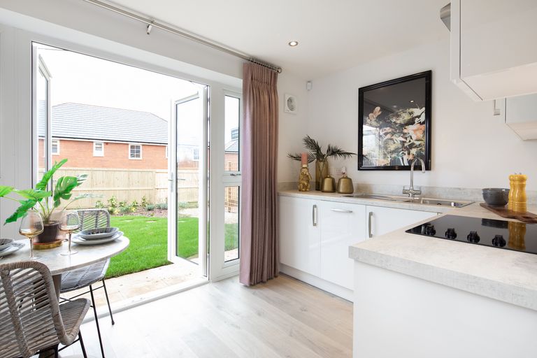 Property 1 of 6. Kitchen With French Doors In The Kenley 2 Bedroom Home