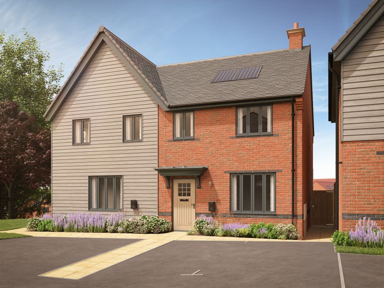Property 1 of 10. A Modern Two-Story House With A Brick And Wood Exterior Sits In Front Of A Clear Blue Sky