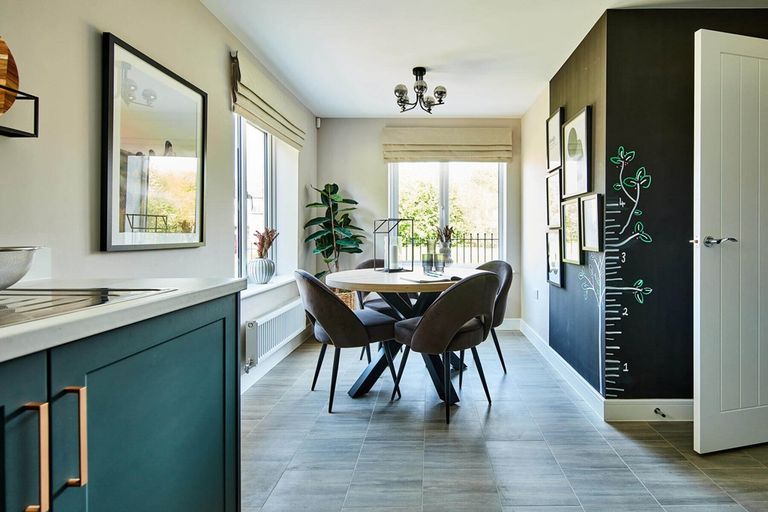 Property 3 of 13. The Dining Area Looks Over The Front Of The Home
