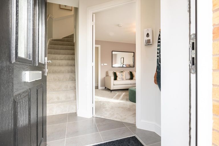 Property 2 of 10. The Entrance Hallway Leads To The Lounge