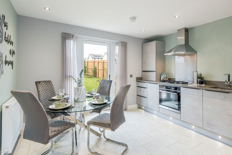 Property 3 of 9. Kitchen And Dining Room In Three Bedroom Home