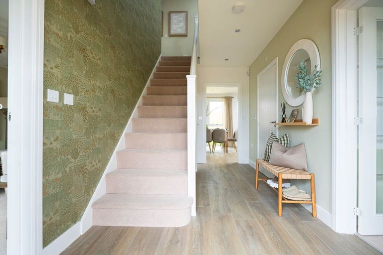 Property 2 of 13. The Central Entrance Hall Is Welcoming With Space For Fitted Understairs Storage