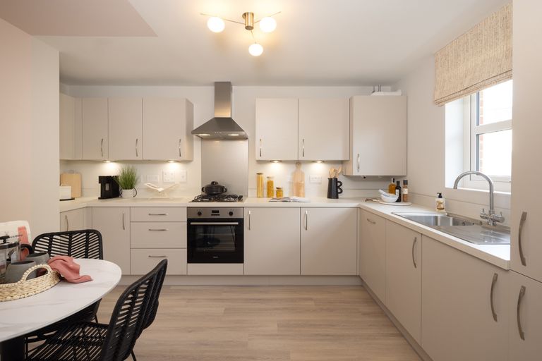 Property 2 of 9. Kitchen And Breakfast Area In 3 Bed Portmore Show Home