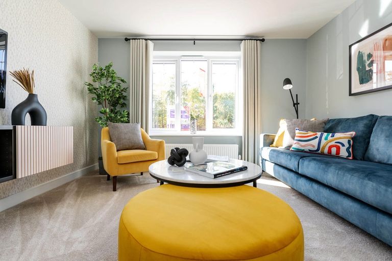 Property 3 of 11. A Bright And Airy Living Room Offers A Place To Spend Time As A Family