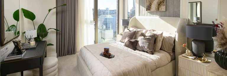 Property 3 of 4. Contemporary Designed Bedroom With Vanity Table, Wall Hanging, Ample Natural Lighting From Tall
