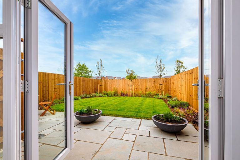 Property 3 of 9. Open French Doors To A Patio And Lawn