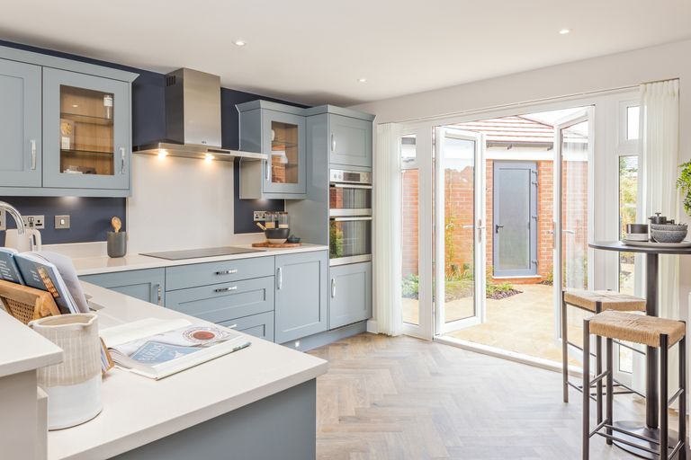 Property 3 of 10. Kitchen And Breakfast Bar In The 4 Bedroom Wychwood