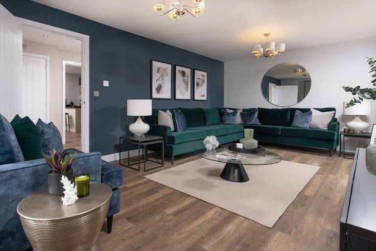 Property 2 of 12. A Spacious Lounge Spans The Width Of The Home