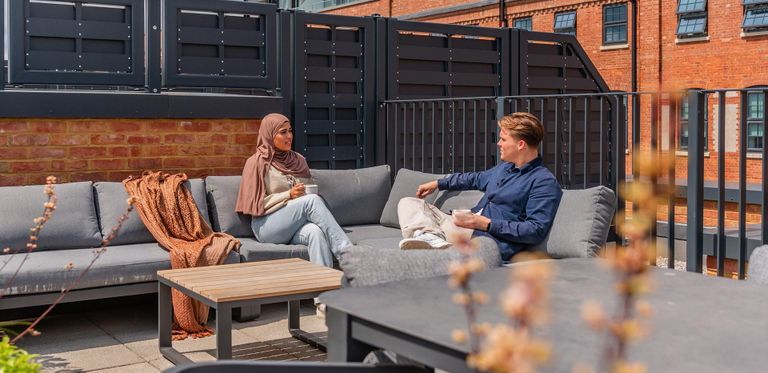 Property 1 of 1. Horlicks Quarter Residents Enjoying The Rooftop Seating Area