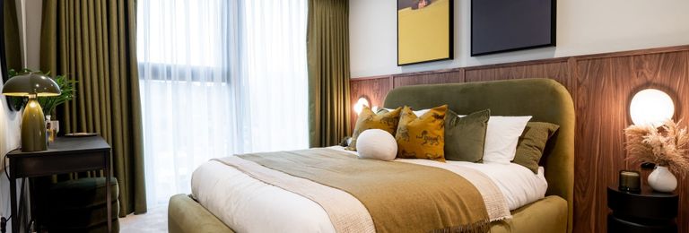 Property 3 of 4. Double Bed With Bedside Tables And Wall Hangings, Moss Green And White Colour Palette
