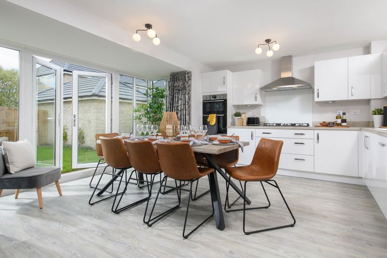 Property 2 of 10. Open-Plan Kitchen/Dining Area With Glazed Bay Leading Onto Garden - Millford Style Home