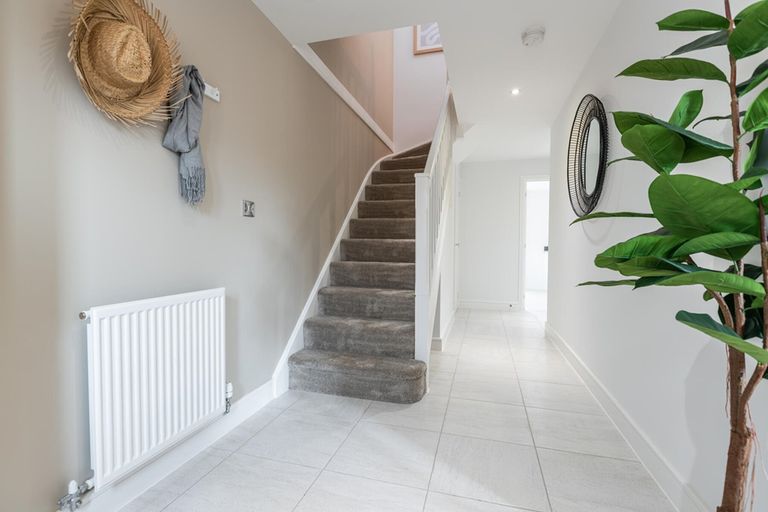 Property 2 of 12. A Bright Hallway Welcomes You Home