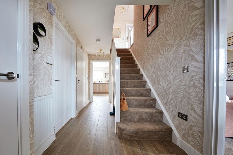 Property 2 of 12. A Separate Entrance Hallway With Storage