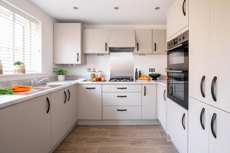 Property 3 of 10. A Bright And Airy Kitchen And Dining Area Is Perfect For Entertaining