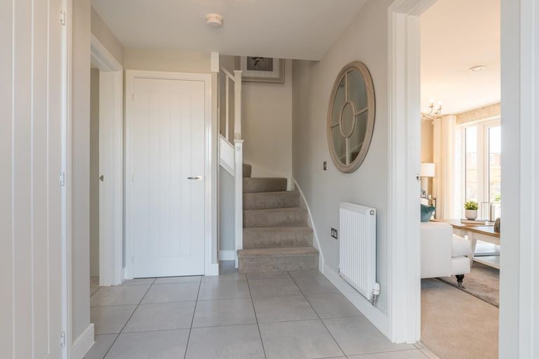 Property 3 of 11. Bright Hallway With Under Stair Storage