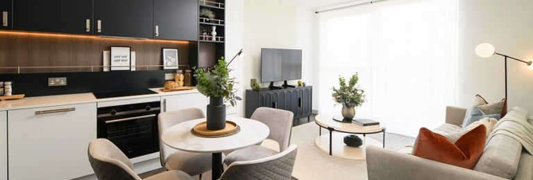 Property 2 of 5. Decorated Living, Dining Area And Kitchenette, Ample Natural Lighting From Tall Windows