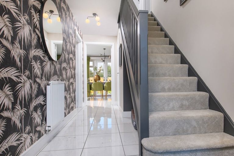 Property 3 of 12. A Welcoming Hallway With Storage Cupboard