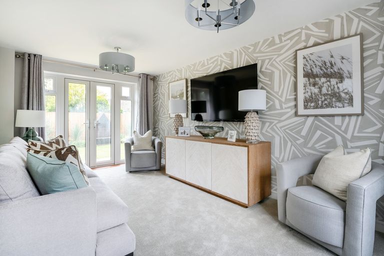 Property 2 of 11. A Bright And Airy Living Room With French Doors To The Garden