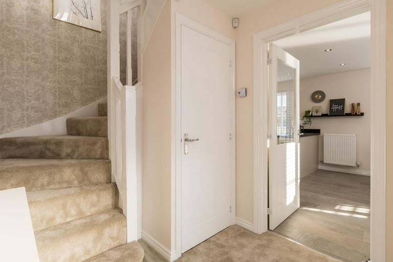 Property 2 of 12. The Trusdale Has A Spacious Hallway With Convenient Downstairs Toilet